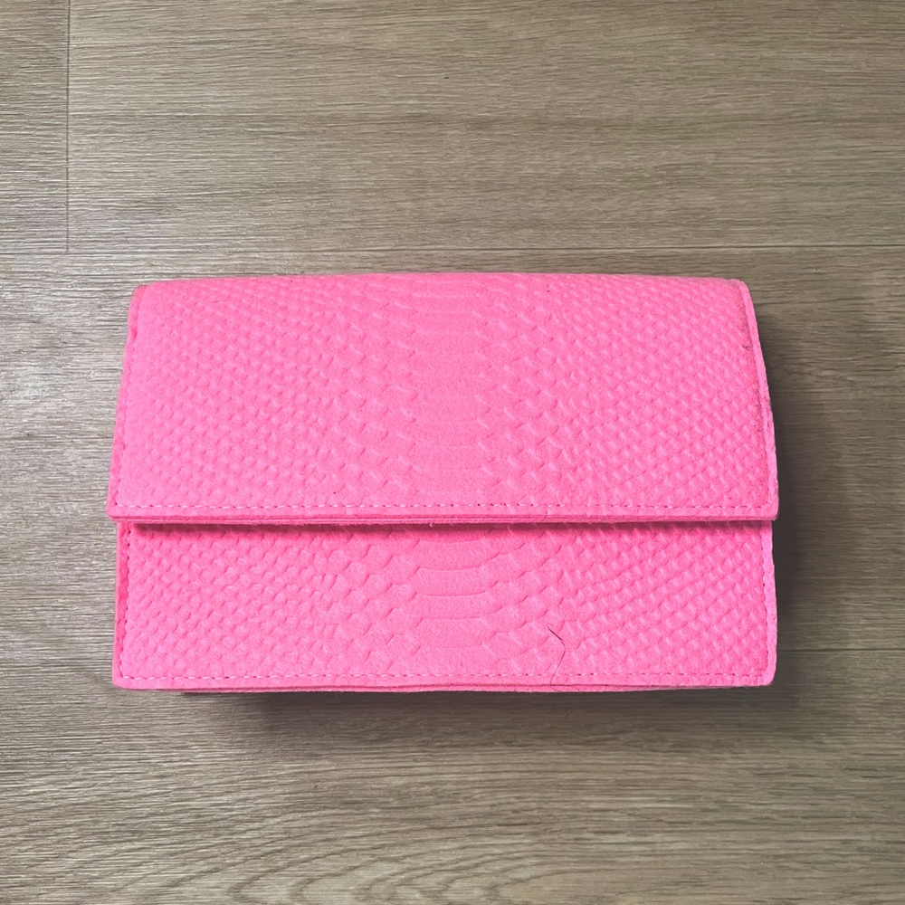 Pink clutch bag